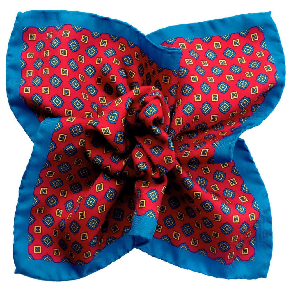 Pochette de costume made in Italie. Rouge et bleu à motifs géométriques