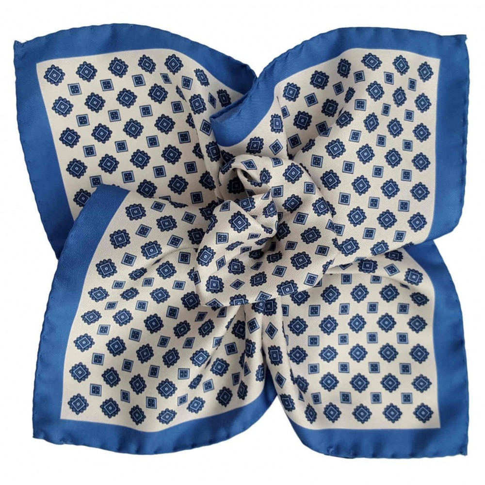 Pochette de costume made in Italie. Bleu et blanc à motifs géométriques